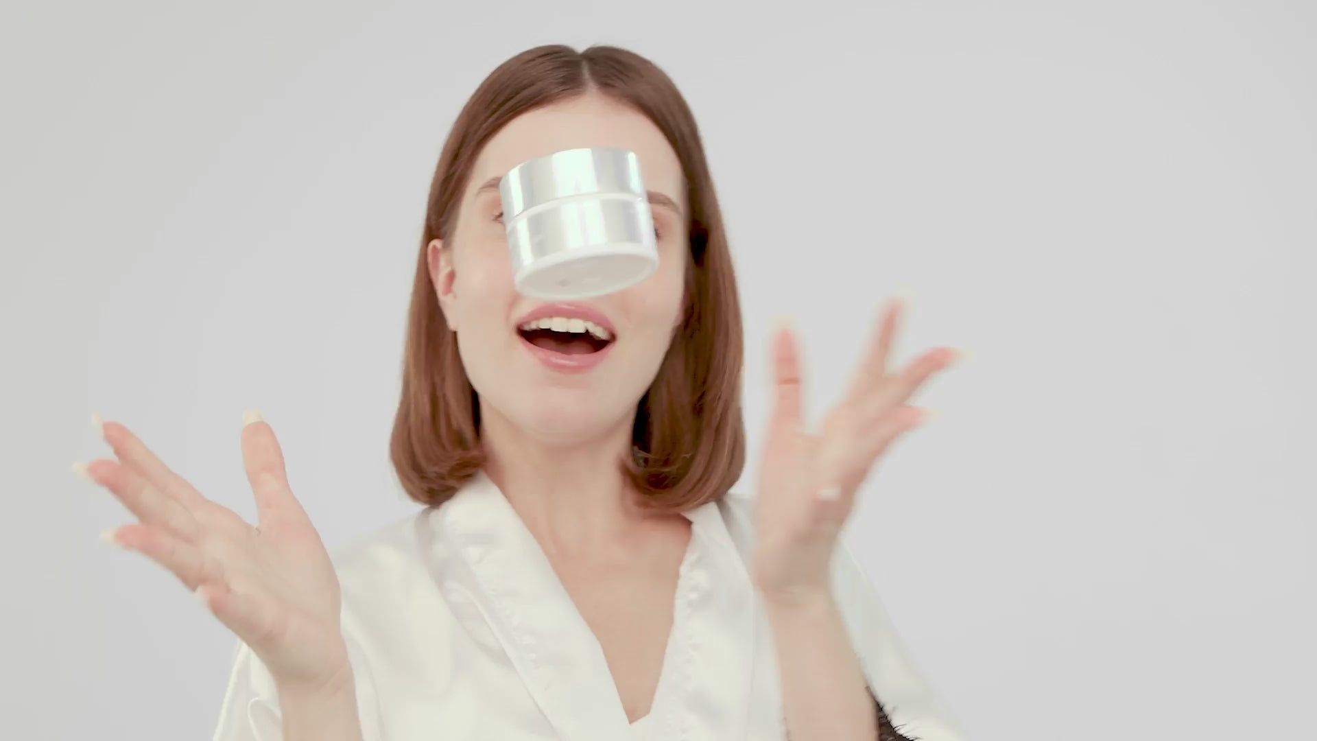 Beautiful women applying Paradigm 99 super glow hydrating face cream